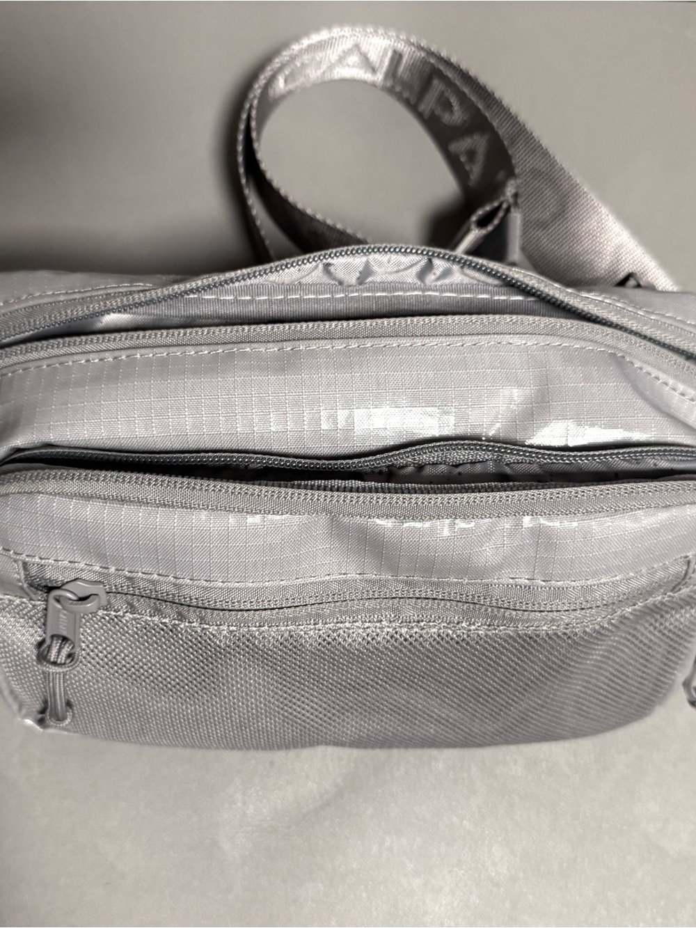 Calpak Light Gray Belt Bag with Multiple Zip Pockets